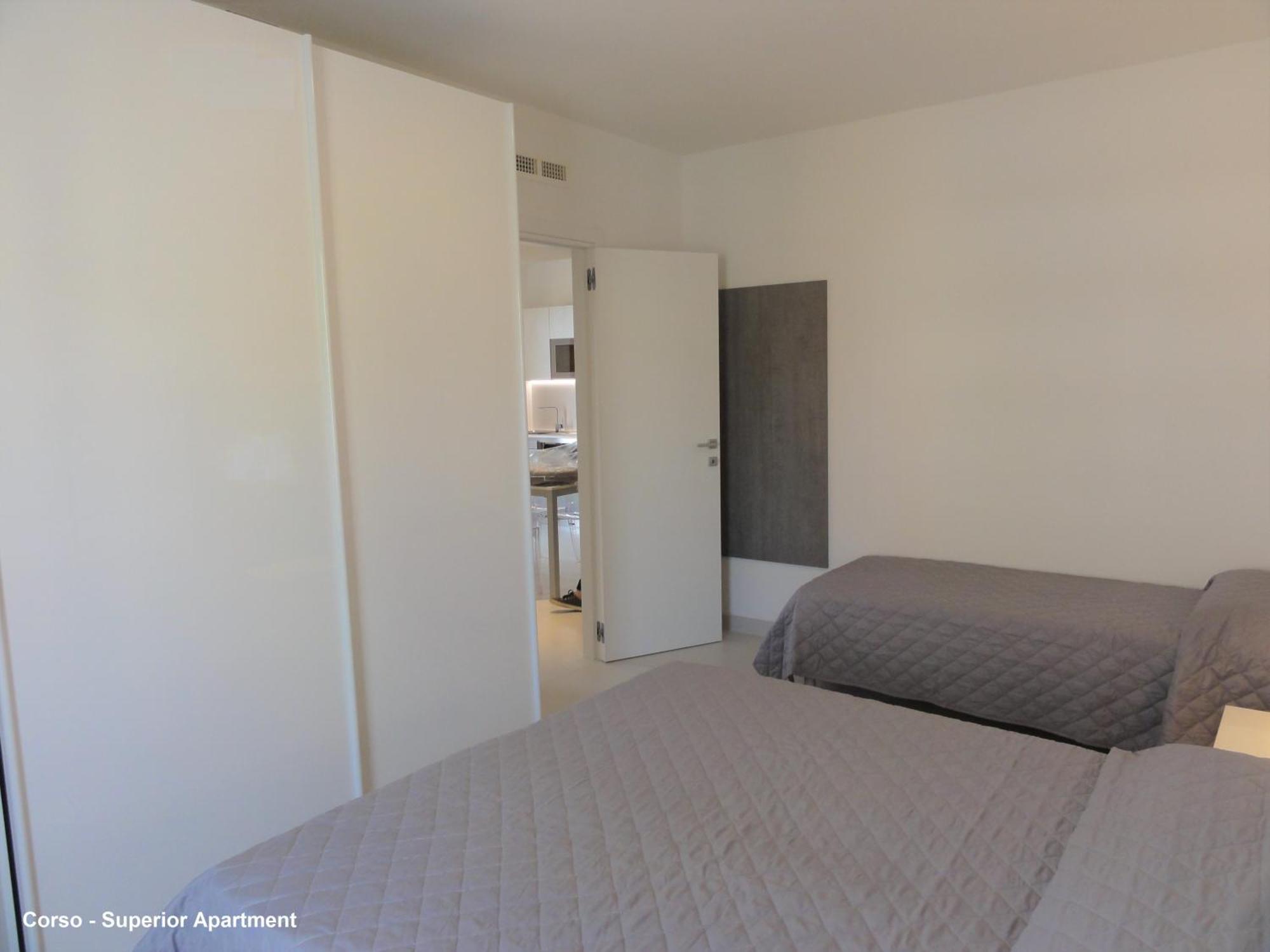 Corso - Appartamenti Bibione Chambre photo